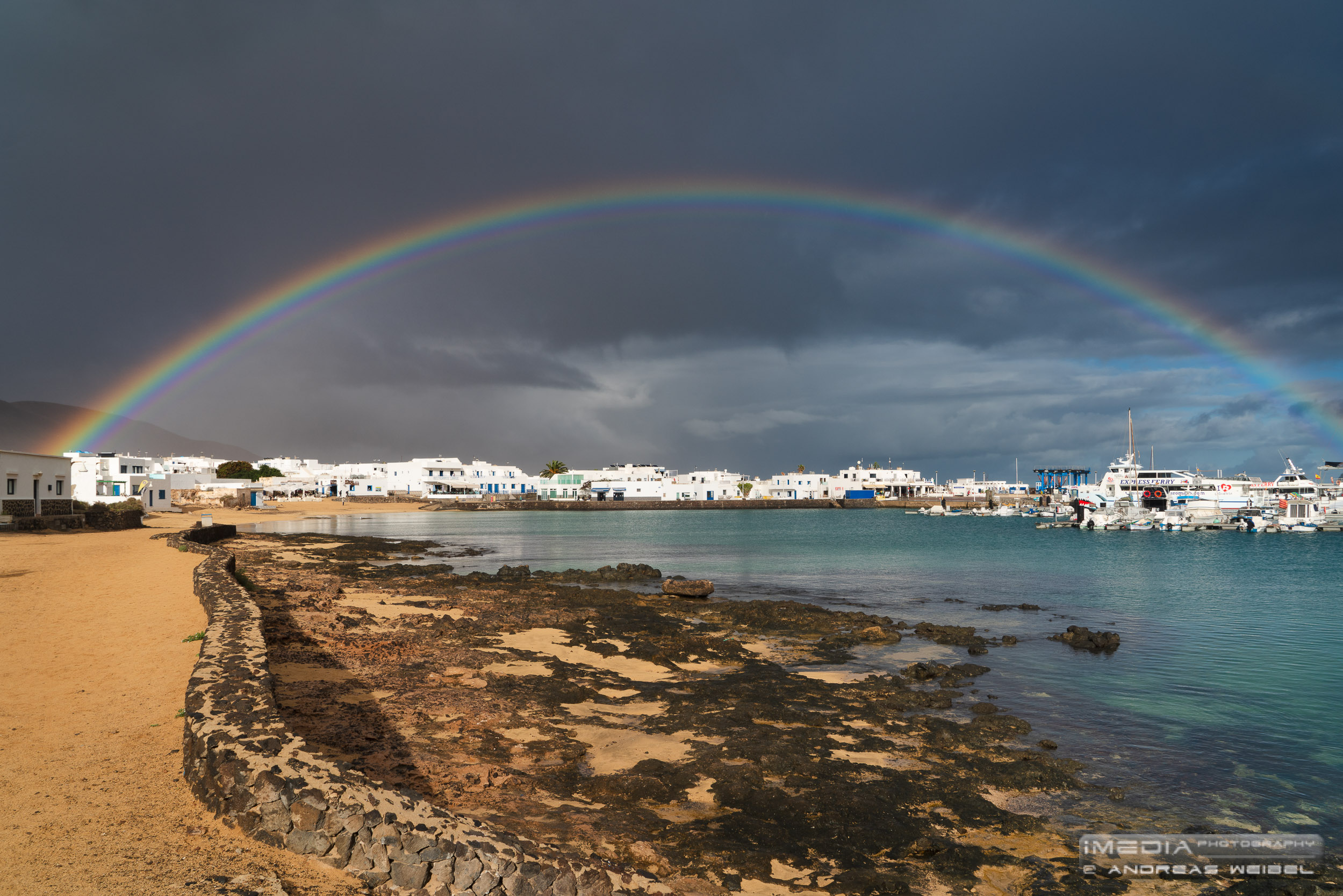 Rainbow over the village of Caleta del Sebo in La Graciosa.